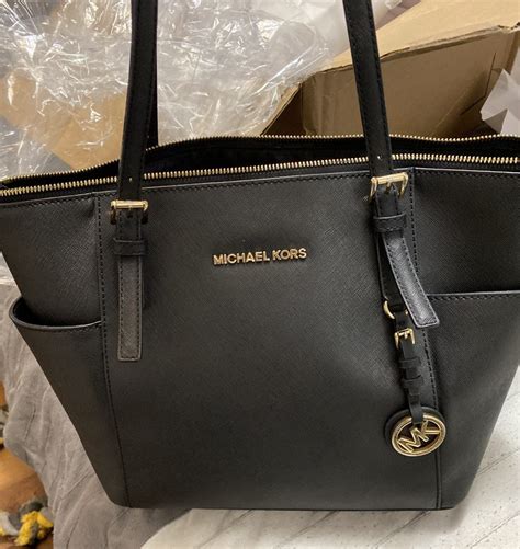 michael kors purse repair near me